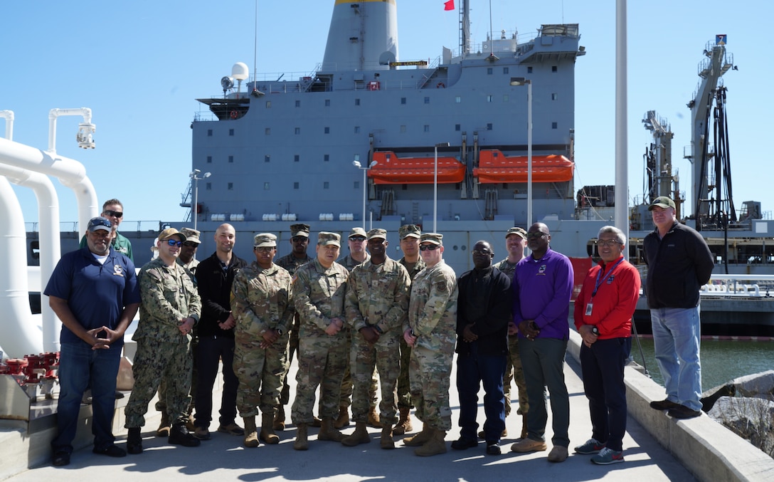 A group of people pose for a picture.