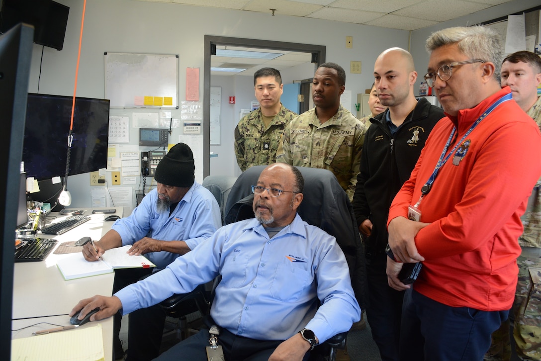 Fuel operations are explains to a group of students.