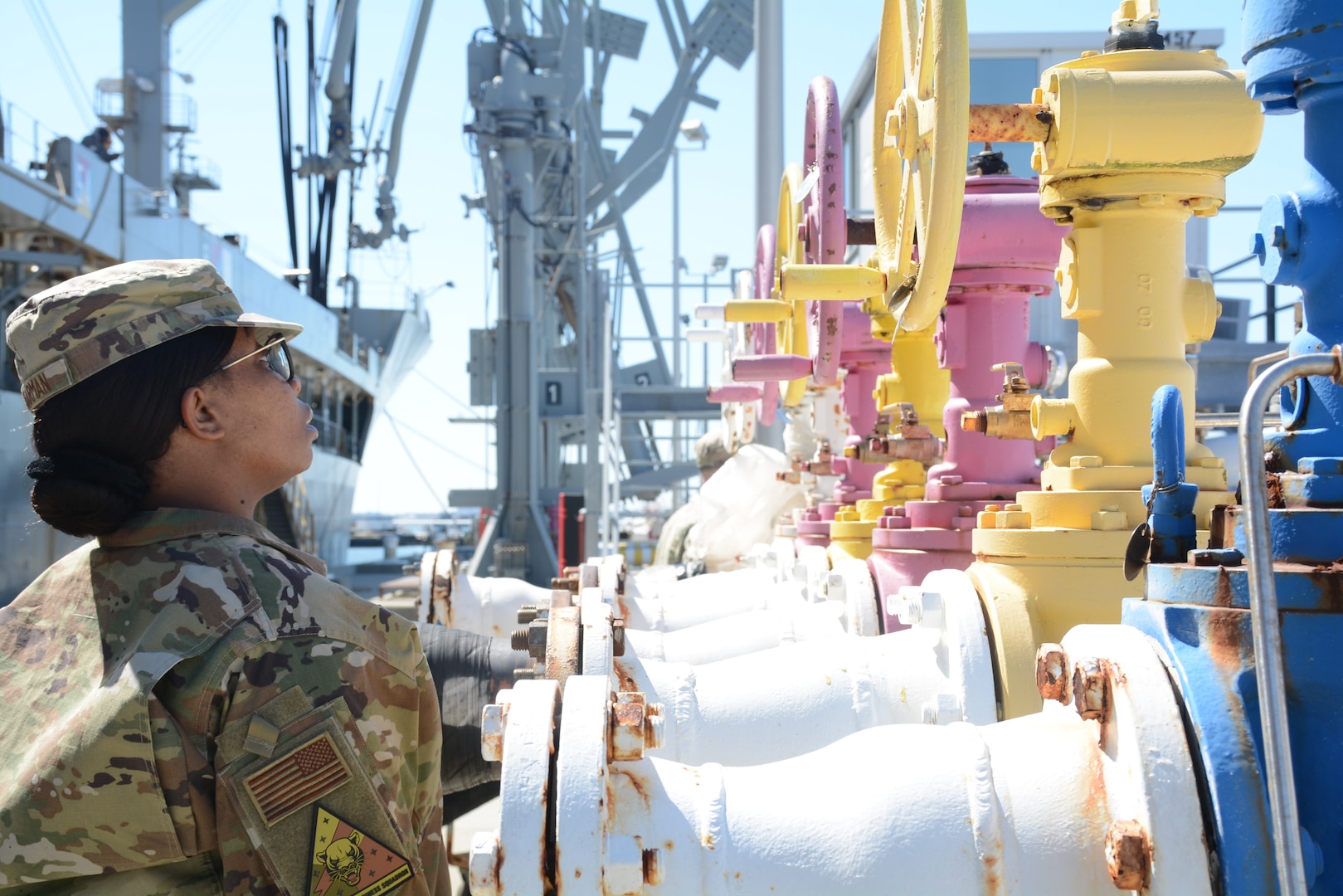 Airmen inspects pipeline infrastructure.