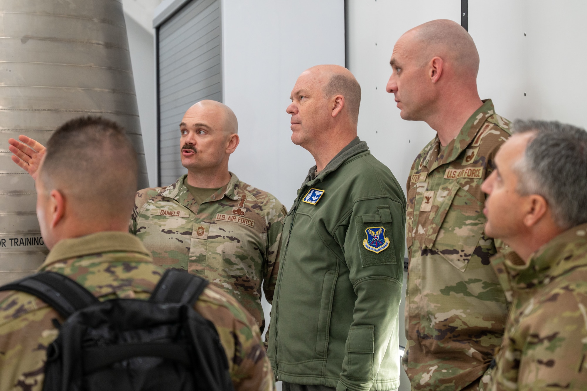 Gen. Davis is briefed by Chief Master Sgt. Daniels during PTR visit.