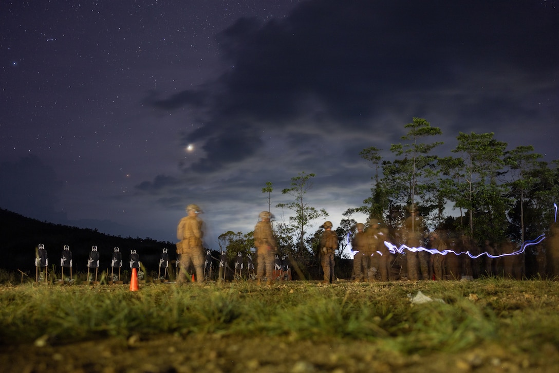 U.S. Marines assigned to 1st Battalion, 5th Marine Regiment, Marine Rotational Force - Darwin, prepare to fire along the firing line during a live-fire exercise as part of Exercise Balikatan 2026 at Philippines Naval Detachment Oyster Bay, Palawan, Philippines, May 5, 2026. Balikatan is a longstanding annual exercise between the Armed Forces of the Philippines and U.S. military that represents the strength of our alliance, improves our capable combined force, and demonstrates our commitment to regional peace and prosperity. (U.S. Marine Corps photo by Cpl. Caleb Goodwin)