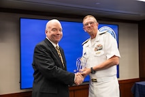 Vice Adm. Johnny Wolfe Jr. (right), director for Portfolio Acquisition Executive (PAE) Strategic Systems Programs (SSP), presents Thomas Demo (left), Lockheed Martin Space, with the Fleet Ballistic Missile (FBM) Lifetime Achievement Award in Washington D.C., on May 13, 2026. 

The FBM Lifetime Achievement Award recognizes SSP’s industry partners who demonstrate an unparalleled degree of professionalism and excellence. To date, 121 people have received the award, including this year’s recipients. The FBM Lifetime Achievement Award is sponsored by SSP Historical, Educational and Recognition Organization (HERO), an all-volunteer 501(c) (3) Non-Profit Organization which works to promote awareness and appreciation of the partnership between government and private industry in the development and maintenance of the Navy’s FBM program.