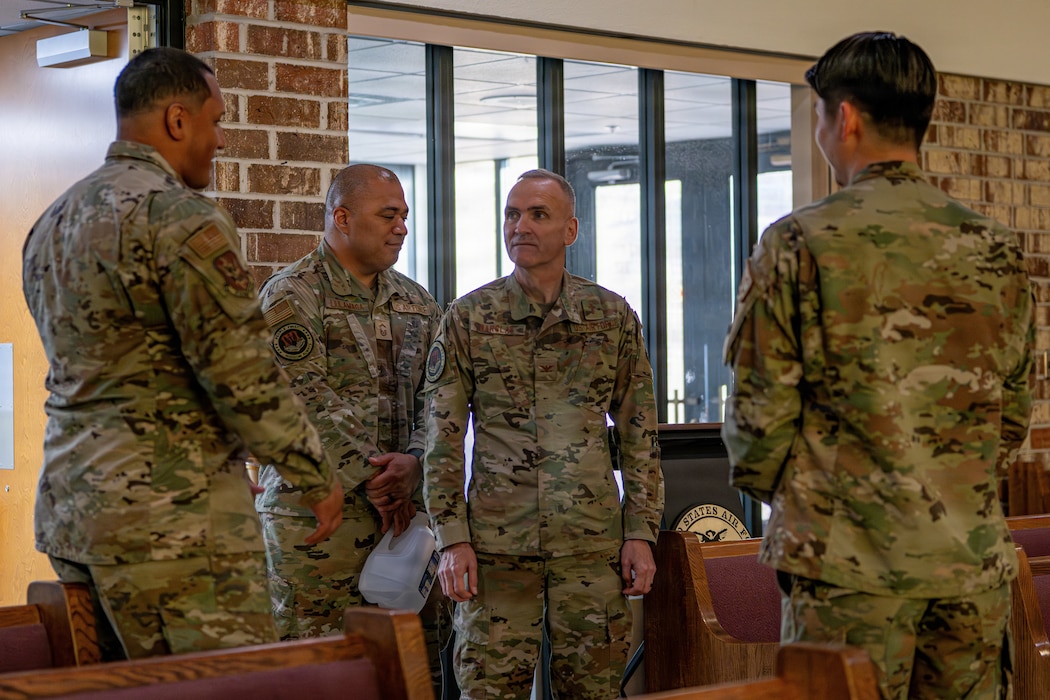 Military members talking.