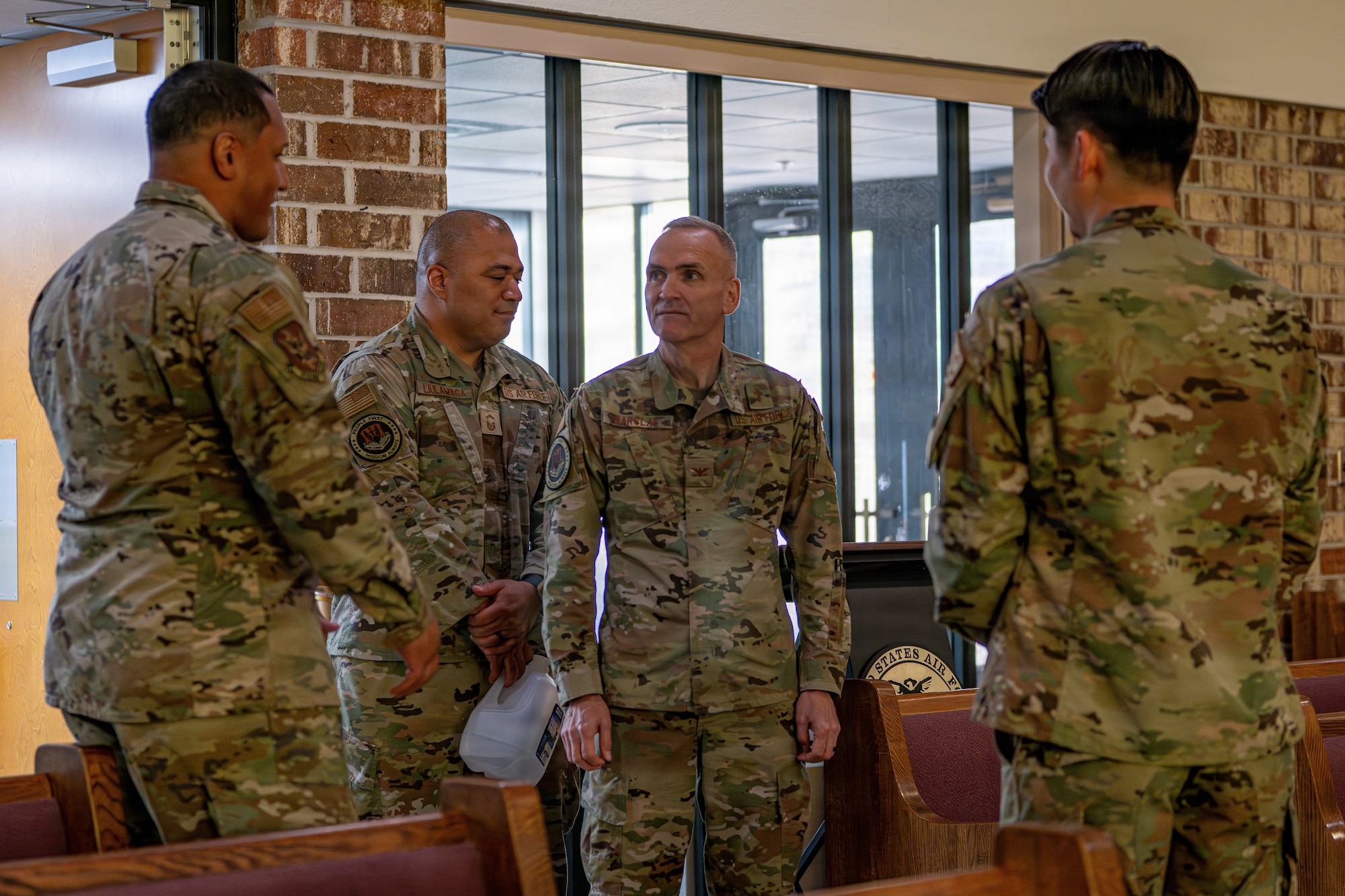 Military members talking.