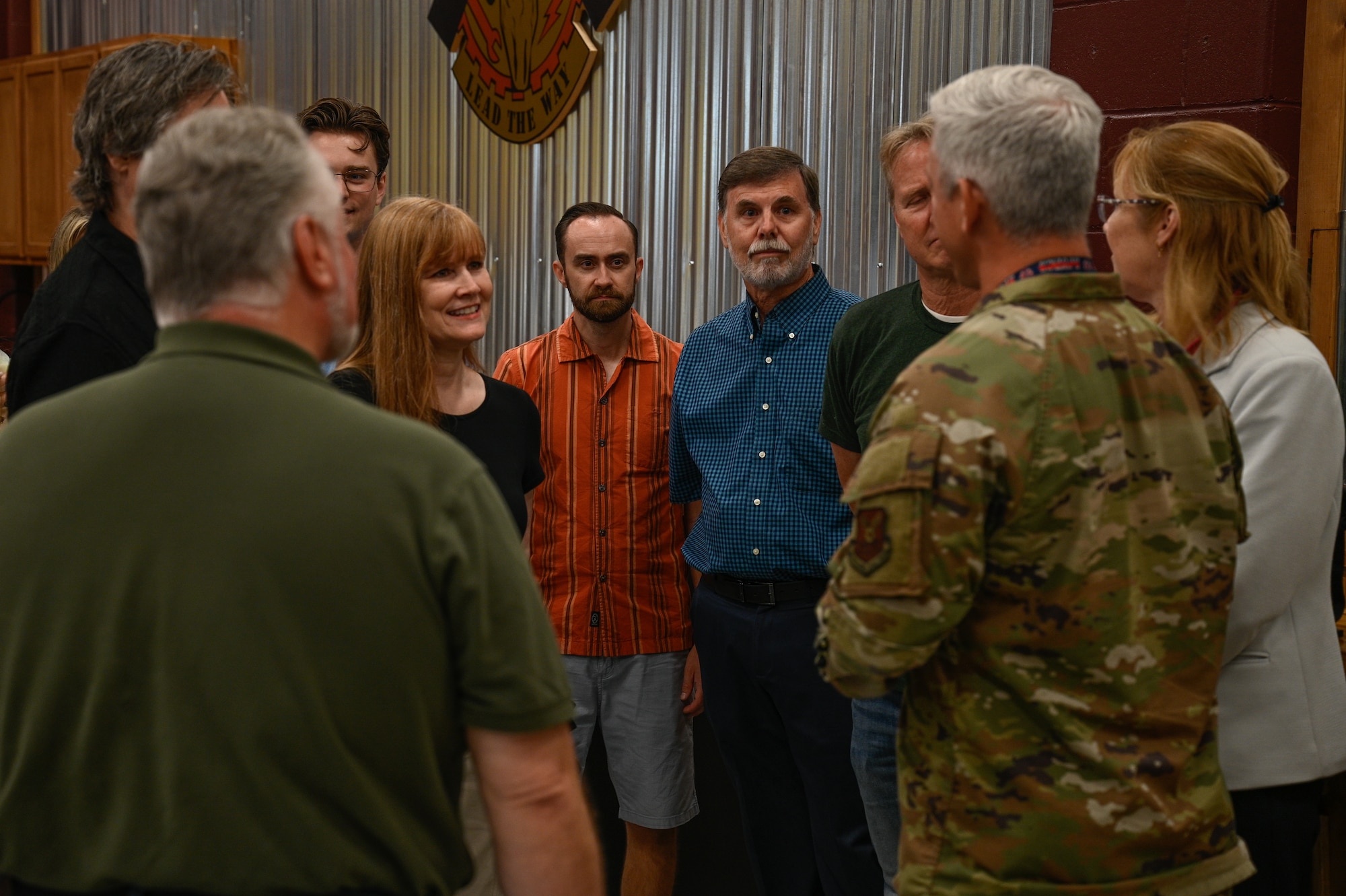 Families of U.S. Air Force Maj. Milton Ramsey and 1st Lt. Russel Voris speak with the 509th Mission Support Group commander prior to a road dedication ceremony at Whiteman Air Force Base, Missouri, May 18, 2026.