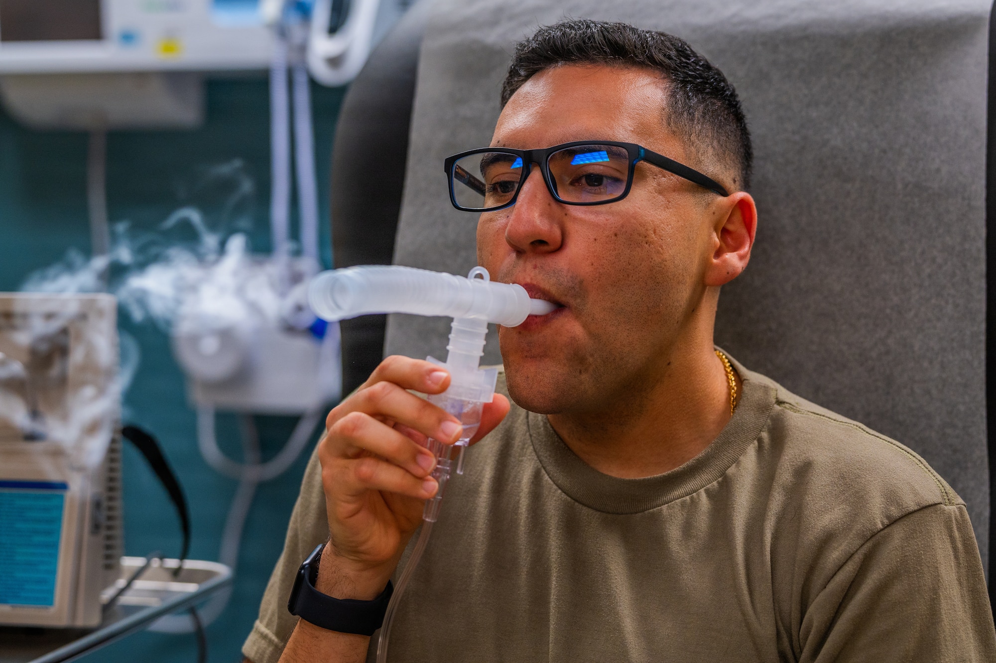 U.S. Air Force Airman 1st Class Josue Guzman Esparza, Luke Medical Group Healthcare Operations Squadron family health medical technician, uses a training nebulizer during Nurse and Tech Week observed at Luke Air Force Base, Arizona, May 13, 2026.