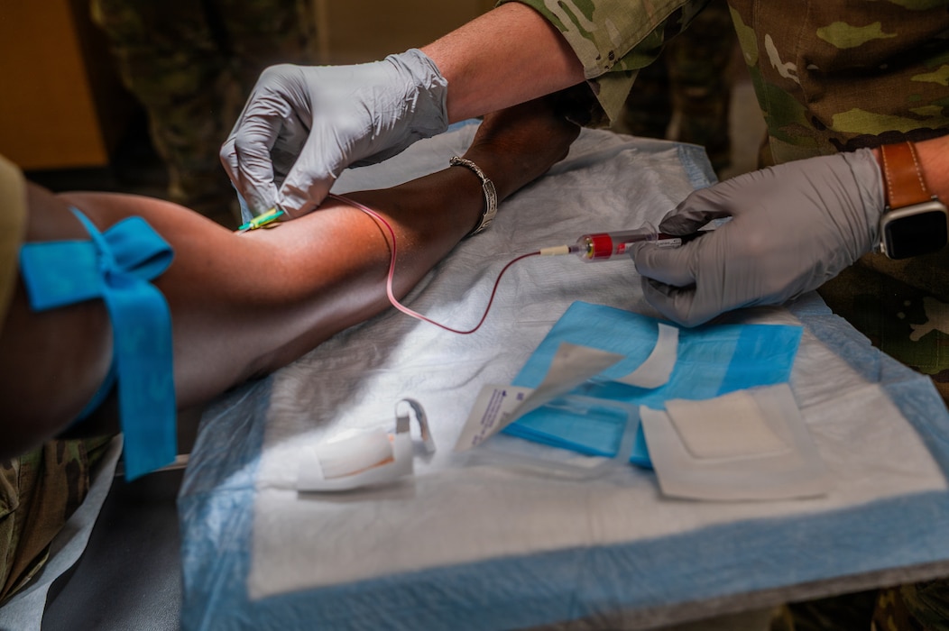 A U.S. Airman draws blood during a training session held at the close of Nurse and Tech Week observed at Luke Air Force Base, Arizona, May 13, 2026.