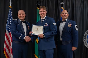 Airmen pose for a photo