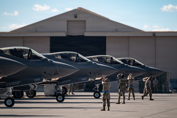 people in front of jets