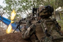 A U.S. Soldier assigned to 2nd Battalion, 27th Infantry Regiment, 3rd Mobile Brigade, 25th Infantry Division, engages an opposing force element with the M250 light machine gun during the Joint Pacific Readiness Center Exportable Exercise at Fort Magsaysay, Nueva Ecija, Philippines, May 13, 2026.