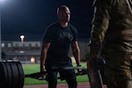 An Air Force military training instructor conducts the three-repetition, maximum dead lift while  competing alongside drill sergeants and drill sergeant leaders during the Fort Jackson & USADSA Drill Sergeant of the Year competition as part of the Joint Warrior Competition at Fort Jackson, South Carolina, April 20, 2026. The Joint Warrior Competition provides an opportunity for drill instructors from other branches to compete against U.S. Army drill sergeants as part of a joint collaboration to share ideas.