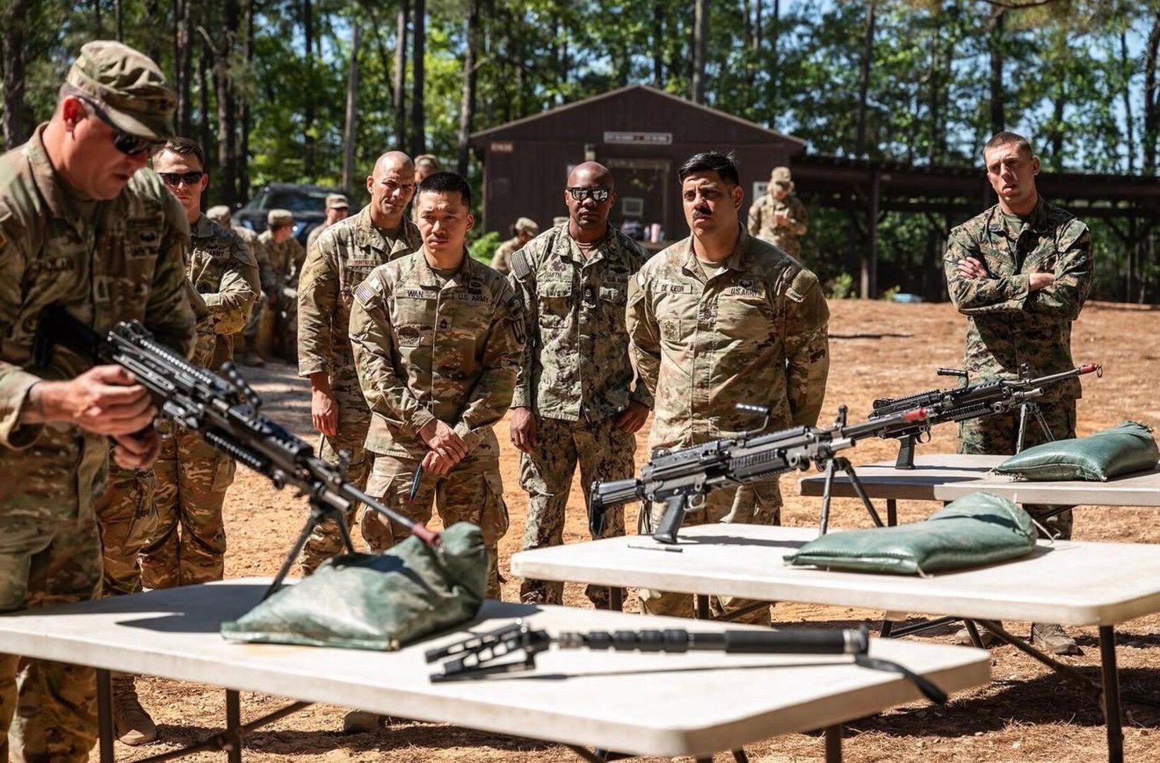 Master Sgt. Jesus Cintron, 320th Training Squadron, observes M4 zeroing and assembly during the Joint Warrior Competition at Fort Jackson, South Carolina, April 20, 2026. (Photo by Sgt. 1st Class Dana Clarke)