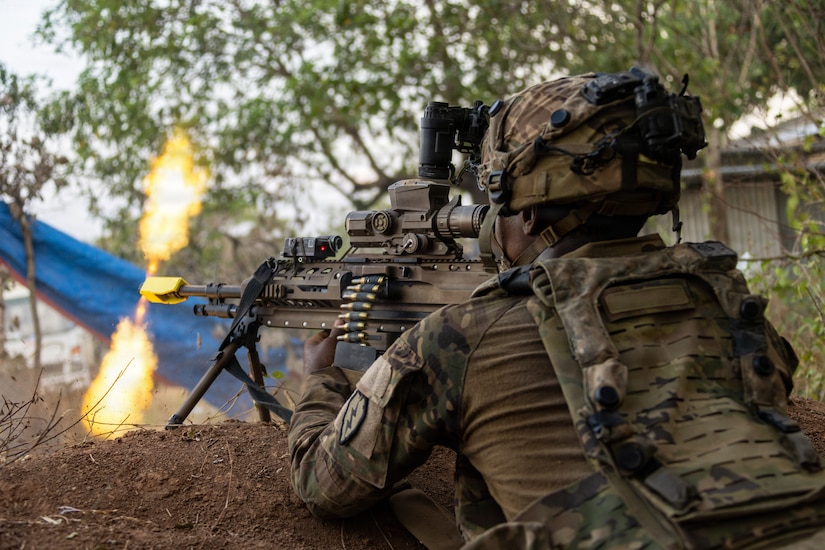 A U.S. Soldier assigned to 2nd Battalion, 27th Infantry Regiment, 3rd Mobile Brigade, 25th Infantry Division, engages an opposing force element with the M250 light machine gun during the Joint Pacific Readiness Center Exportable Exercise at Fort Magsaysay, Nueva Ecija, Philippines, May 13, 2026.