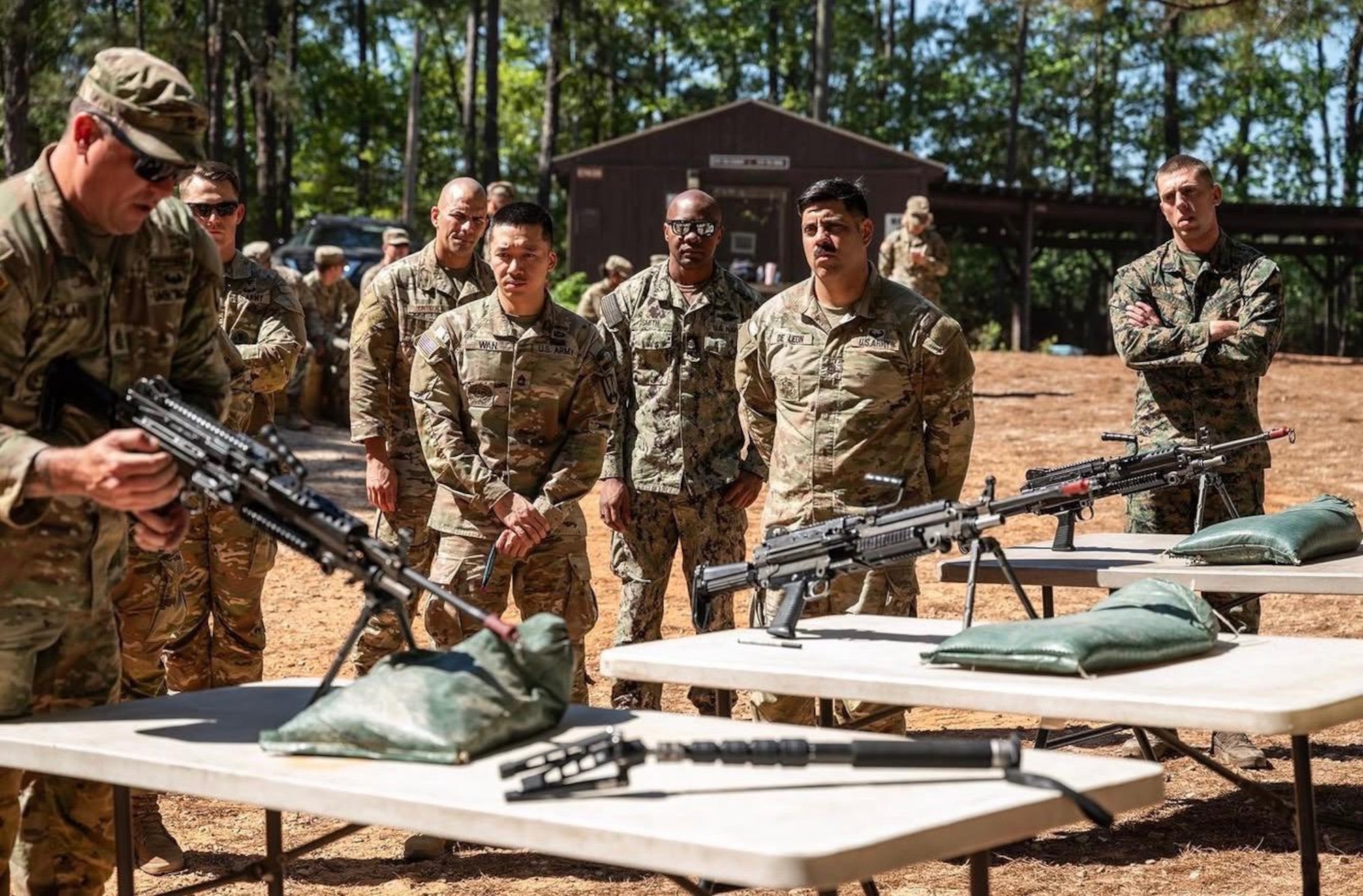 Master Sgt. Jesus Cintron, 320th Training Squadron, observes M4 zeroing and assembly during the Joint Warrior Competition at Fort Jackson, South Carolina, April 20, 2026. (Photo by Sgt. 1st Class Dana Clarke)