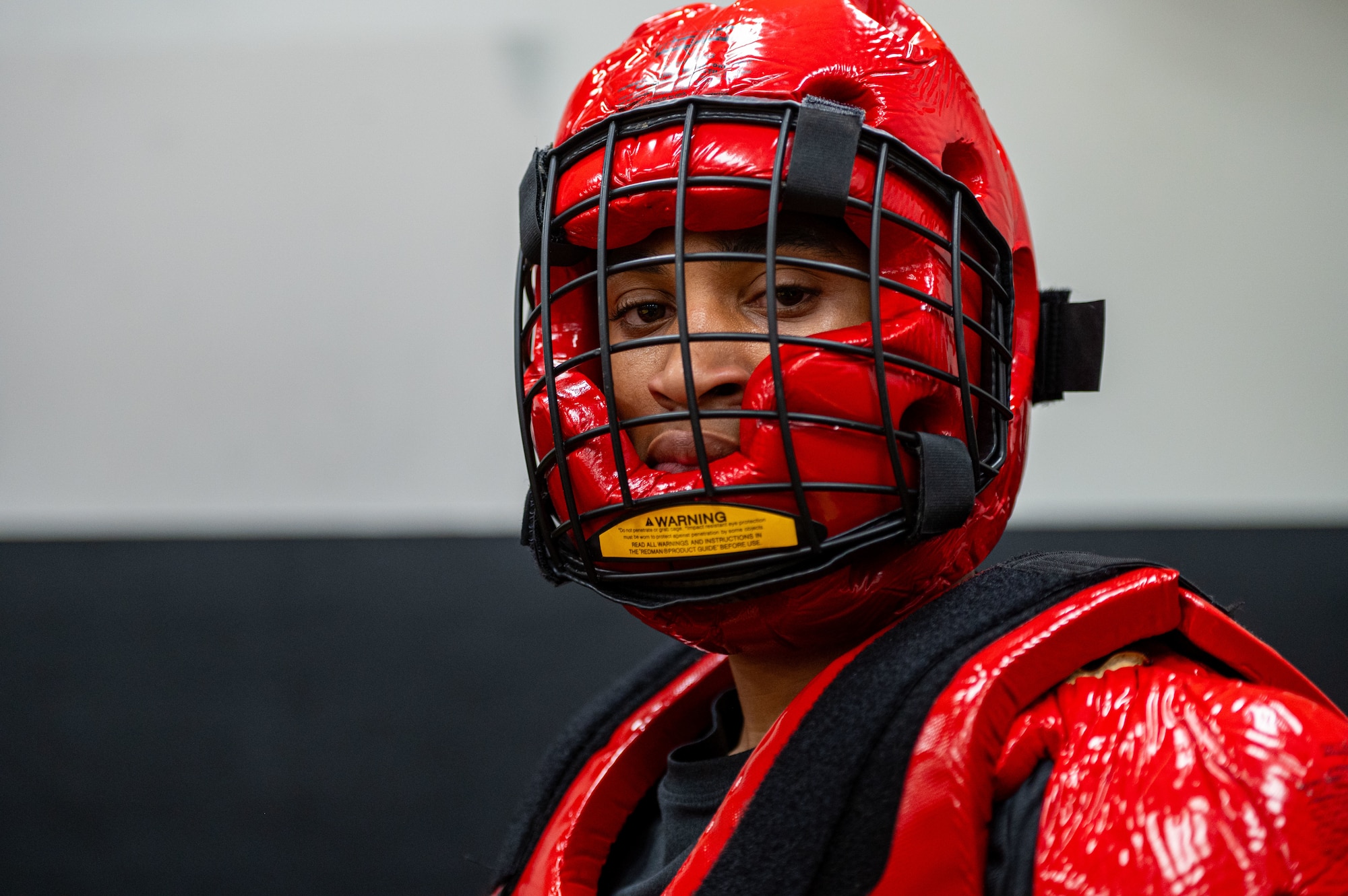 U.S. Air Force Staff Sgt. Lemuel Spratt, 421st Combat Training Squadron Phoenix Raven Qualification Course instructor, wears protective gear during the “Red Man” evaluation at Joint Base McGuire-Dix-Lakehurst, N.J., April 22, 2026.
