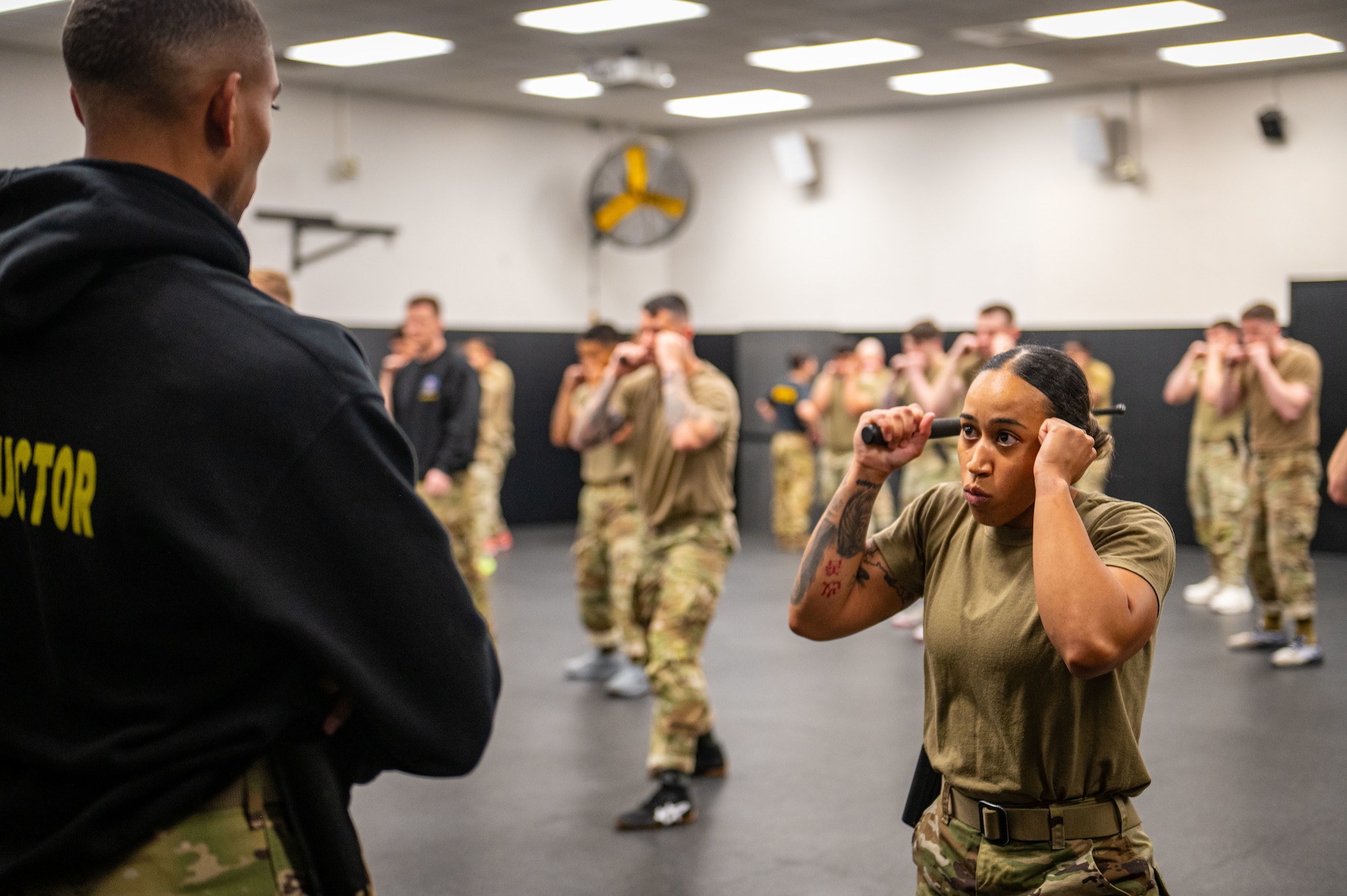 U.S. Air Force Staff Sgt. Braylin Fermin, 205th Base Defense Squadron fire team leader at Stewart Air National Guard Base, N.Y., practices a defensive stance during combatives training at the Phoenix Raven Qualification Course at Joint Base McGuire-Dix-Lakehurst, N.J., April 21, 2026.