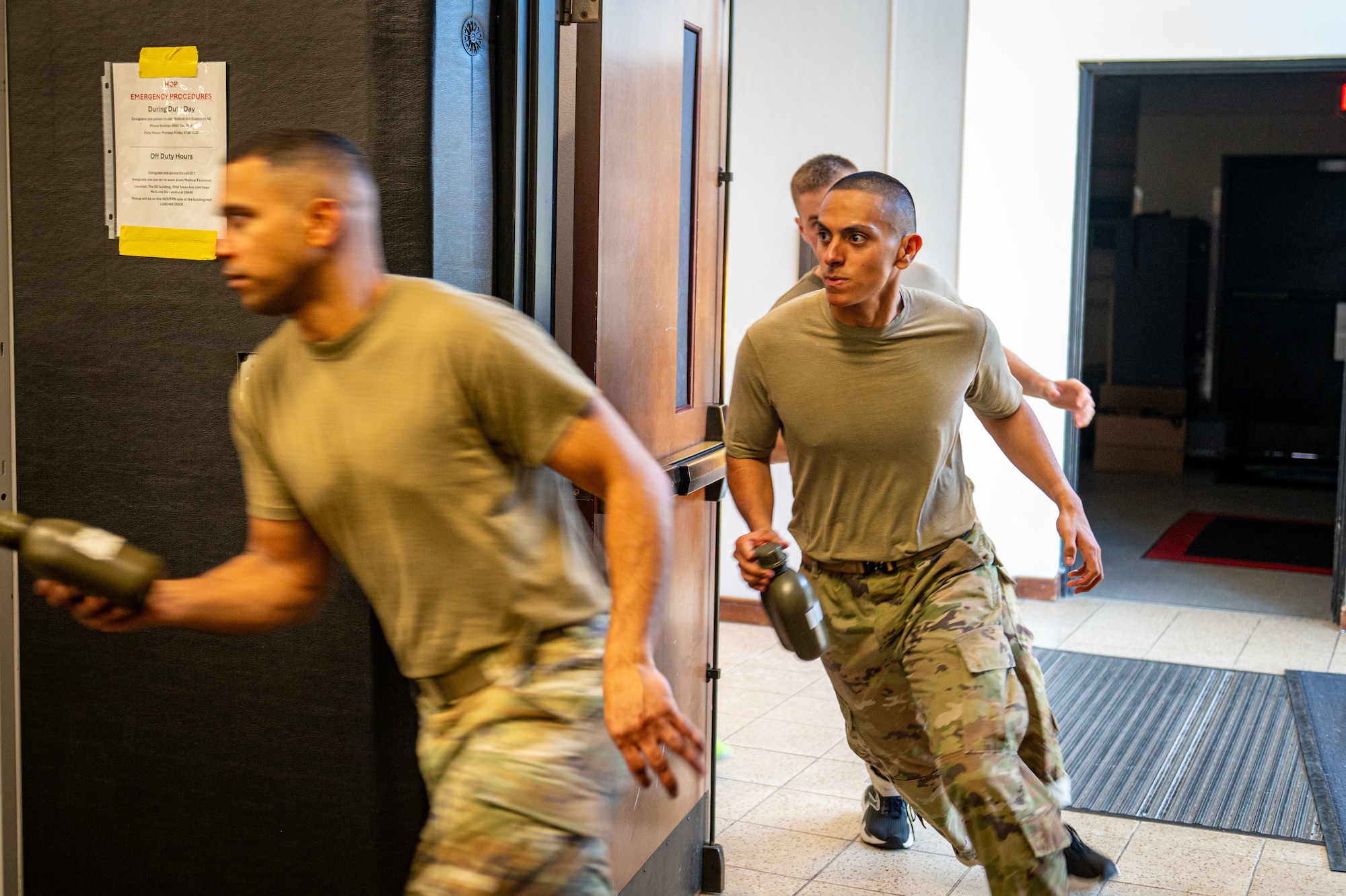 U.S. Air Force Senior Airman Jeanpaul Tello, 55th Security Forces Squadron National Airborne Operations Center security team member at Offutt Air Force Base, Neb., enters training during the Phoenix Raven Qualification Course at Joint Base McGuire-Dix-Lakehurst, N.J., April 21, 2026.