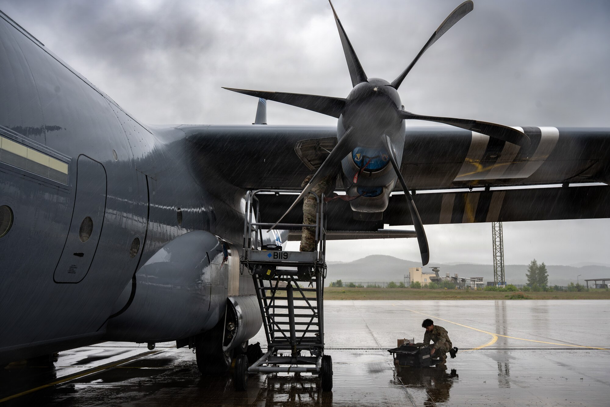 U.S. Air Force Airmen 1st Class Andrew Lowe, left, and Airman 1st Class Ramy Farahat, 86th Aircraft Maintenance Squadron maintainers, perform engine repairs on a C-130J Hercules at Ramstein Air Base, Germany, May 14, 2026.
