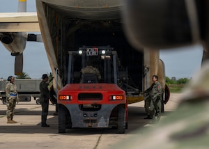 U.S. Air Force Senior Airman Adamu Issaka, a load joint inspection representative assigned to 88th Aerial Port Squadron, loads gear onto a Royal Moroccan Air Force C-130H to demonstrate engine running on and offloading procedures during Africa Lion 26 at 3rd Royal Moroccan Air Base, Kenitra, Morocco, April 27, 2026.