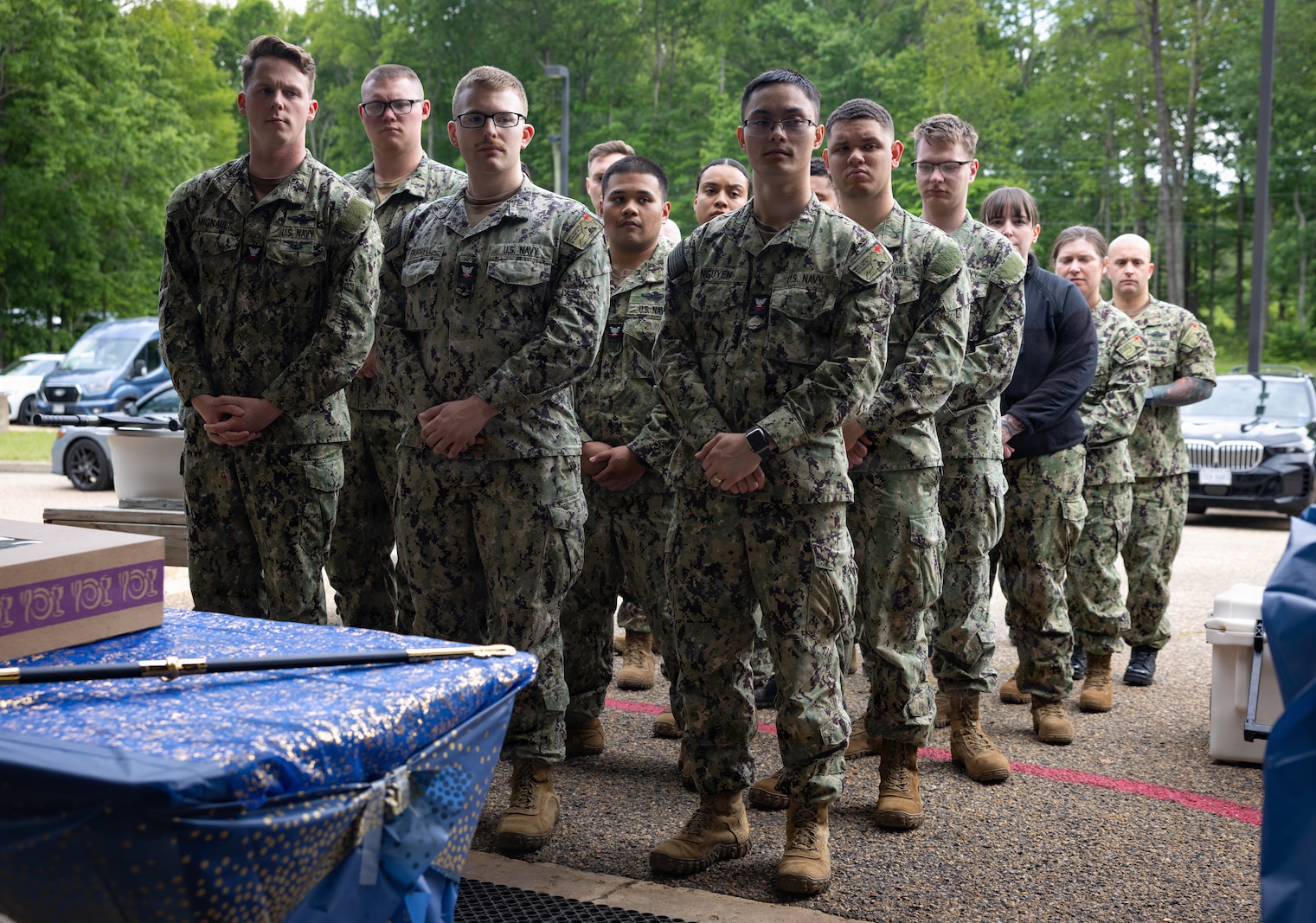 U.S. Navy hospital corpsmen with the David R. Ray Branch Health Clinic stand in formation during the Nurse Appreciation Week cake cutting ceremony at the David R. Ray Branch Health Clinic on Marine Corps Base Quantico, Virginia, May 13, 2026. The cake cutting ceremony reflects on the history of the Nurse Corps and symbolizes the passing of knowledge from the most senior officer to the most junior officer. (U.S. Marine Corps photo by Sgt. Chancellor Reynolds)