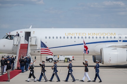 Members of the Joint Service Color Guard and cordon present ceremonial honors during a departure ceremony for King Charles III.