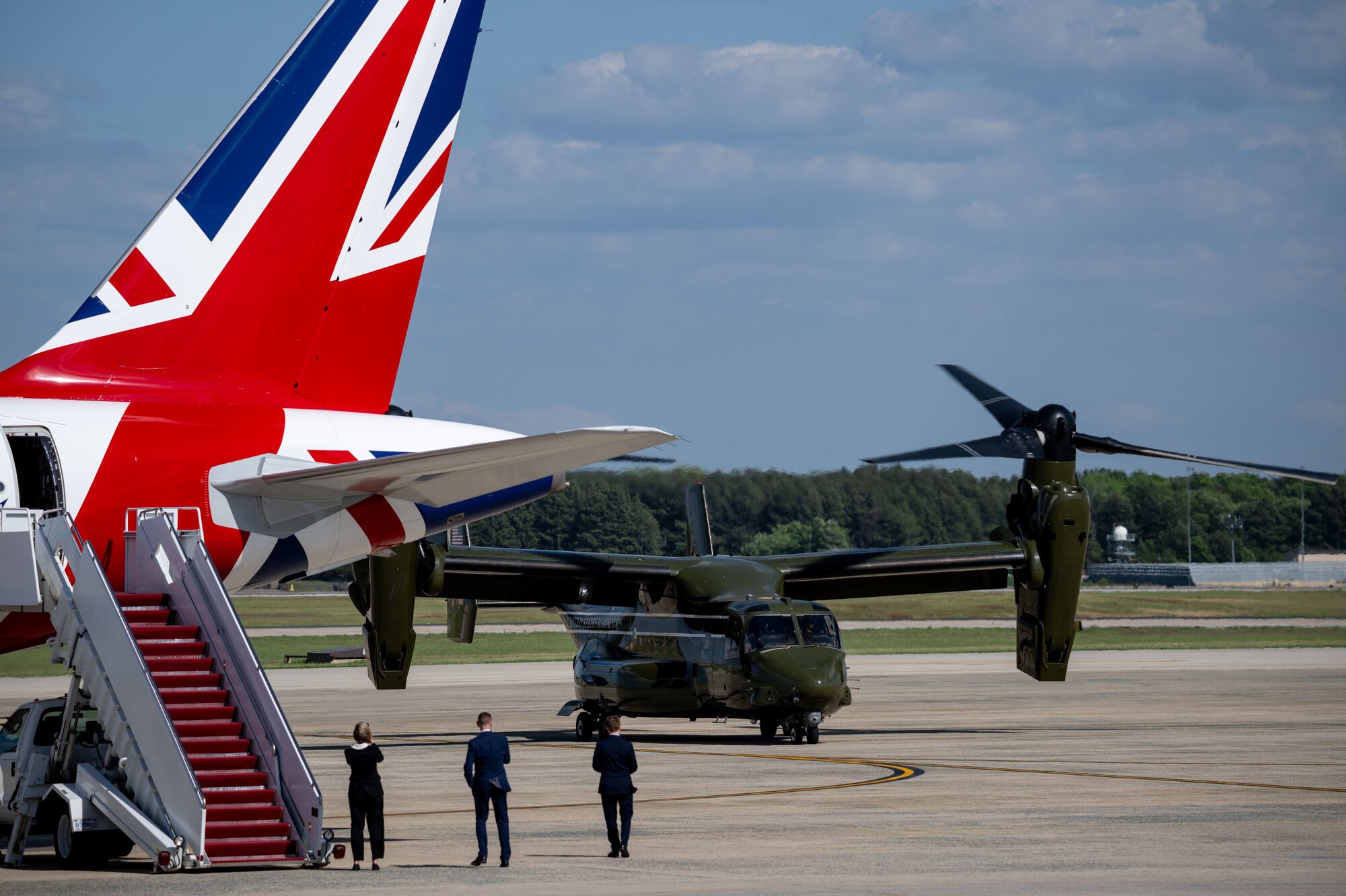 A helicopter lands before a departure ceremony for King Charles III.
