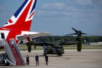 A helicopter lands before a departure ceremony for King Charles III.