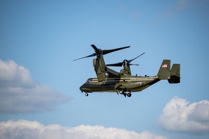 A U.S. Marine Corps MV-22 Osprey aircraft flies in.