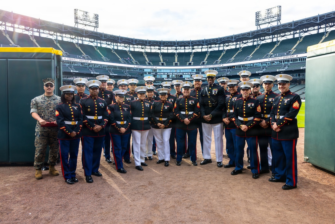 U.S. Marines pose for a photo at Guaranteed Rate Field in Chicago, Illinois, May 13, 2026. The applicants participated in a swear-in ceremony for all branches of the armed services prior to the start of the game. (U.S. Marine Corps photo by Lance Cpl. Kayla Goldman)
