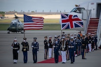 Members of the Joint Service Color Guard and cordon present ceremonial honors during a departure ceremony for King Charles III.