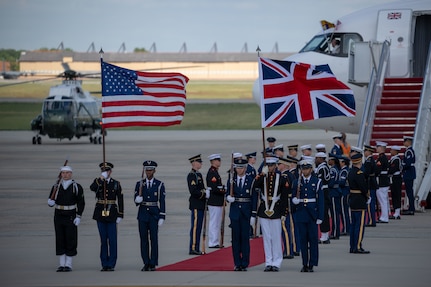 Members of the Joint Service Color Guard and cordon present ceremonial honors during a departure ceremony for King Charles III.