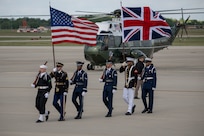 Members of the Joint Service Color Guard and cordon present ceremonial honors during a departure ceremony for King Charles III.