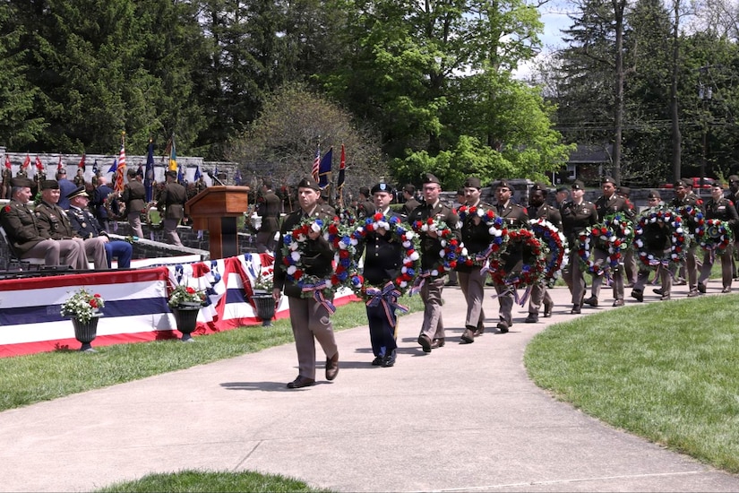 28th Infantry Division Soldiers carry wreaths for placement during the 28th ID’s annual memorial service May 17, 2026, in Boalsburg, Pennsylvania. Each year, Soldiers assigned to the Pennsylvania Army National Guard gather at the 28th Infantry Division Shrine on the grounds of the Pennsylvania Military Museum in Boalsburg to honor fallen Soldiers and recognize Gold Star families during the division’s annual memorial service. (U.S. Army National Guard photo by Staff Sgt. Kenneth Shirk)