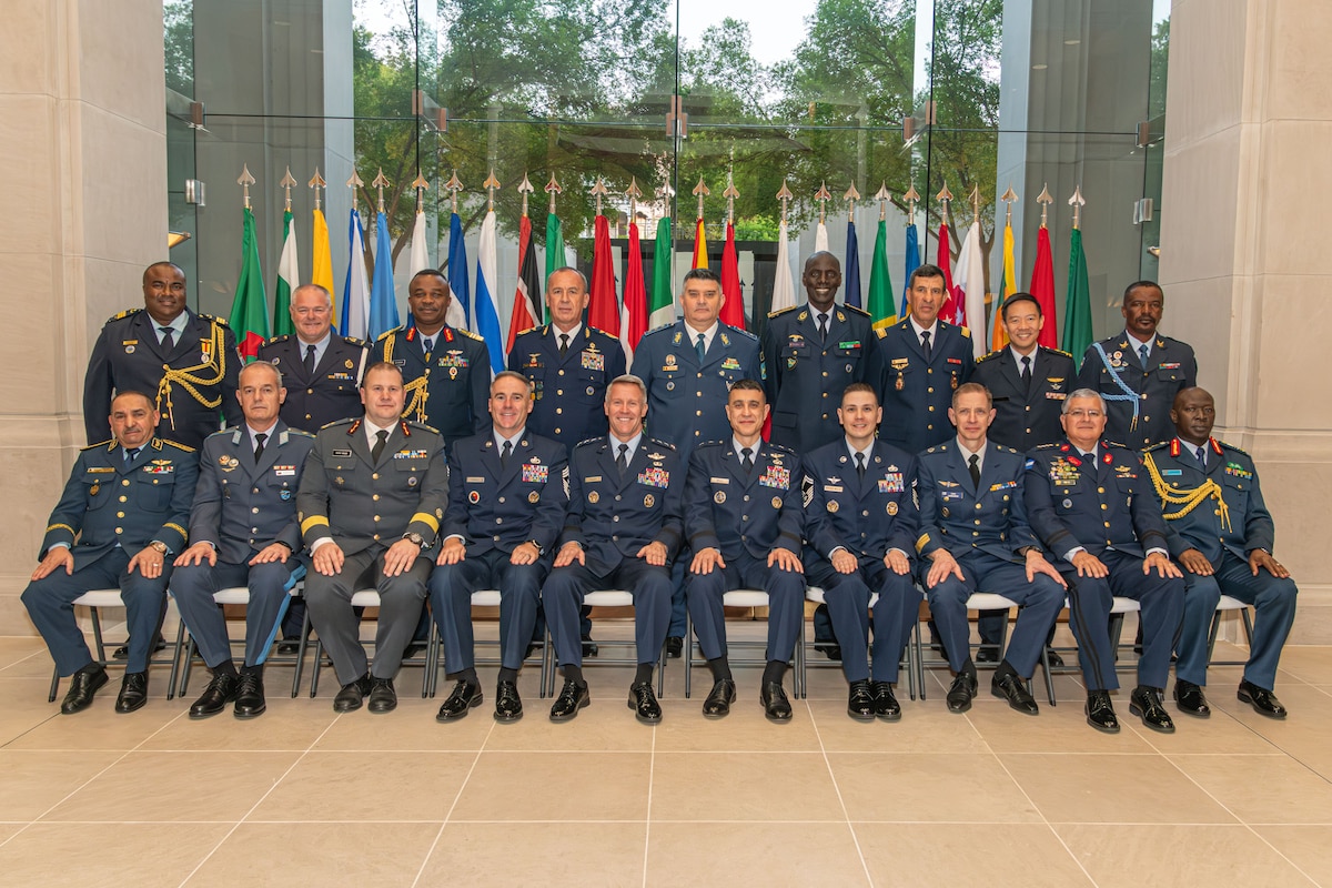 International Honor Roll inductees and Air Force dignitaries pose for a group photo at the Alabama Supreme Court during a reception prior to the ceremony, Apr. 9, 2026.