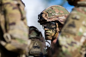 U.S. Army Pfc. Jonathan Hively, an infantryman, with 3rd Platoon, Charlie Company, 4th Battalion, 70th Armor Regiment, 1st Armored Brigade Combat Team, 1st Armored Division, stands amongst his squad as they prepare for a live-fire situational training exercise at Vuosanka Training Area, Finland, May 15, 2026. From April 27 to May 31, 2026 U.S. and Allied forces will exercise NATO’s Eastern Flank Deterrence Initiative, demonstrating NATO’s ability to fight and win on the modern battlefield. Nearly 15,000 troops from eleven nations will train across the High North, Baltic region, and Poland, executing rapid maneuvers, air defense, counter-drone operations, and cyber defense to validate NATO’s regional defense plans in real time. This series of linked exercises, including Saber Strike, Immediate Response, and Swift Response, turns investment into capability. Soldiers integrate unmanned systems, AI-enabled command and control, and live data networks to move faster, decide faster, and fight more effectively across all domains. Sword 26 demonstrates how U.S. Army Europe and Africa drives transformation at scale while strengthening deterrence. Together with our Allies, we are building a unified, lethal force ready to defend NATO territory and respond to any threat. (U.S. Army Reserve photo by Sgt. Addison Shinn)
