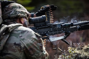 U.S. Army Pfc. Jimmy Ou, an infantryman gunner, with Charlie Company, 4th Battalion, 70th Armor Regiment, 1st Armored Brigade Combat Team, 1st Armored Division, engages targets with an M240B machine gun during a live-fire situational training exercise at Vuosanka Training Area, Finland, May 15, 2026. From April 27 to May 31, 2026 U.S. and Allied forces will exercise NATO’s Eastern Flank Deterrence Initiative, demonstrating NATO’s ability to fight and win on the modern battlefield. Nearly 15,000 troops from eleven nations will train across the High North, Baltic region, and Poland, executing rapid maneuvers, air defense, counter-drone operations, and cyber defense to validate NATO’s regional defense plans in real time. This series of linked exercises, including Saber Strike, Immediate Response, and Swift Response, turns investment into capability. Soldiers integrate unmanned systems, AI-enabled command and control, and live data networks to move faster, decide faster, and fight more effectively across all domains. Sword 26 demonstrates how U.S. Army Europe and Africa drives transformation at scale while strengthening deterrence. Together with our Allies, we are building a unified, lethal force ready to defend NATO territory and respond to any threat. (U.S. Army Reserve photo by Sgt. Addison Shinn)