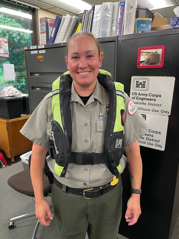 U.S. Army Corps of Engineers Nashville District Park Ranger Danielle Packer wears an inflatable life jackets at Lake Barkley May 15, 2026, in Grand Rivers, Kentucky, while participating in “Wear Your Life Jacket to Work Day.” (USACE Photo)