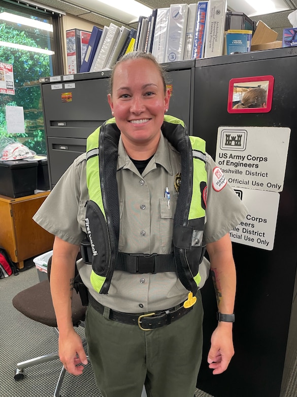 U.S. Army Corps of Engineers Nashville District Park Ranger Danielle Packer wears an inflatable life jackets at Lake Barkley May 15, 2026, in Grand Rivers, Kentucky, while participating in “Wear Your Life Jacket to Work Day.” (USACE Photo)