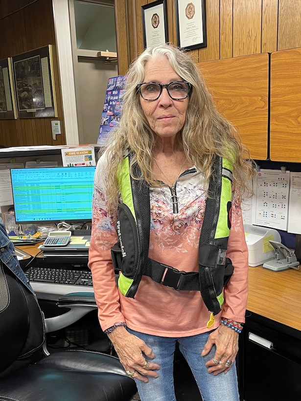 U.S. Army Corps of Engineers Nashville District employee Susan Pierce wears an inflatable life jackets at Lake Barkley May 15, 2026, in Grand Rivers, Kentucky, while participating in “Wear Your Life Jacket to Work Day.” (USACE Photo)