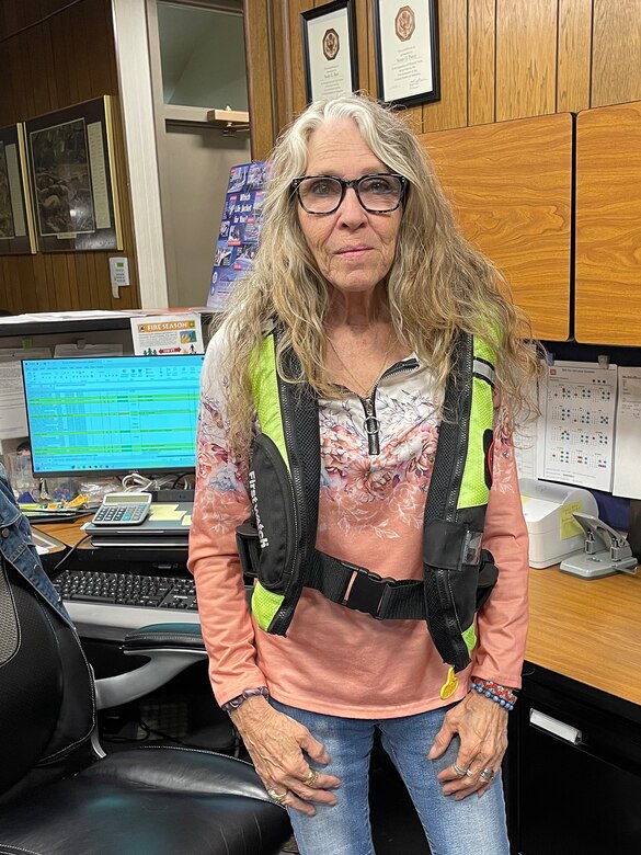 U.S. Army Corps of Engineers Nashville District employee Susan Pierce wears an inflatable life jackets at Lake Barkley May 15, 2026, in Grand Rivers, Kentucky, while participating in “Wear Your Life Jacket to Work Day.” (USACE Photo)