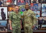 U.S. Navy Adm. Rich Correll, commander, U.S. Strategic Command and U.S. Army Gen. Xavier T. Brunson, commander of United Nations Command, Combined Forces Command, and United States Forces Korea, pose for a photo during a visit at USSTRATCOM headquarters on Offutt Air Force Base, Nebraska, May 11, 2026.
