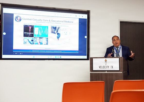 SAN ANTONIO – (May 18, 2026) – Dr.  Darrin Frye, chief science director, Naval Medical Research Unit (NAMRU) San Antonio, gave a mission overview of research directorates at the Defense Health Agency’s annual Promote Professional Engagement amongst Military Laboratories (ProPEL) Science Symposium held at the VelocityTX Innovation Center. The event brought together military medical professionals, researchers, students, and academic partners to explore the latest in defense health innovation.  Attendees at ProPEL heard from several San Antonio Centers of Excellence to include research presentations on Battlefield/Point of Injury, Prolonged Field Care/Early Interventions, and Integrated Rehabilitation and Human Performance. Collaborating and working alongside a wide range of research and development partners keeps Navy Medicine Research & Development (NMR&D) abreast of best practices and advances in medical knowledge. NAMRU San Antonio, part of NMR&D conducts gap-driven combat casualty care, craniofacial, and directed energy research in support of Navy, Marine Corps and joint U.S. warfighter health readiness and lethality while engaged in routine and expeditionary operations. (Photo by Burrell Parmer, NAMRU San Antonio Public Affairs/Released)