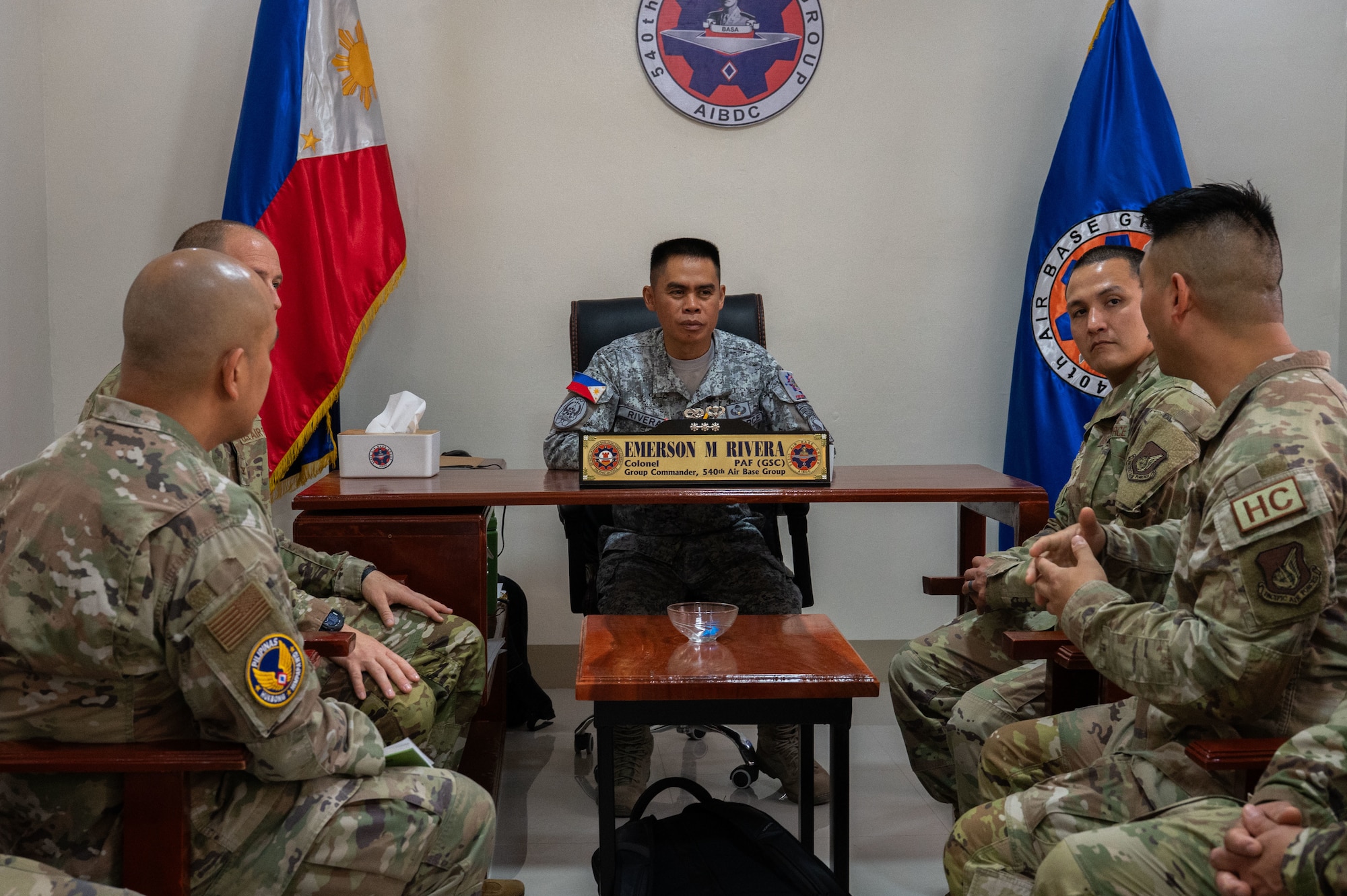U.S. Air Force 21st Air Expeditionary Wing leadership speak with Philippine Air Force Col. Emerson Rivera, 540th Air Base Group commander during Exercise Balikatan 2026 at Basa Air Base, April 24, 2026. Balikatan is a longstanding annual exercise between the Armed Forces of the Philippines and U.S. military that represents the strength of our alliance, improves our capable combined force, and demonstrates our commitment to regional peace and prosperity. (U.S. Air Force photo by Senior Airman Alondra Cristobal Hernandez)