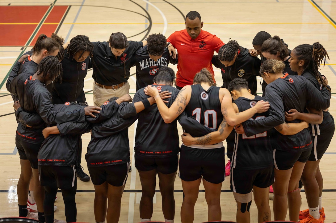 The U.S. Marine Corps Women’s Basketball Team huddles up before 2026 Armed Forces Women’s Basketball Championship at Paige Field House, Marine Corps Base Camp Pendleton, Calif., May 13, 2026. This year’s tournament, hosted at MCB Camp Pendleton from May 12-17, brings together service members from the Army, Marine Corps, Navy and Air Force, highlighting athletic excellence while strengthening camaraderie and esprit de corps across the military community. (U.S. Marine Corps photo by Cpl. Estrada)