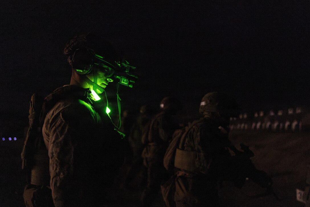 U.S. Marines with India Company, Marine Combat Training Battalion, participate in a nighttime short bay live fire exercise at Marine Corps Base Camp Pendleton, California, May 12, 2026. The Short Bay Distance Stage is designed to simulate close combat conditions, emphasizing speed, target engagement under pressure and marksmanship fundamentals at short distances rather than long-range qualification courses. (U.S. Marine Corps photo by Cpl. Akamelu)
