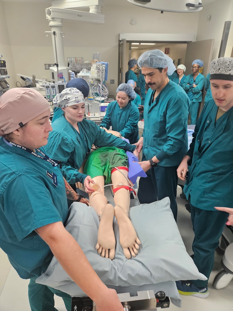Clinicians and nursing staff assigned to David Grant Medical Center conduct pressure injury prevention training during an operating room education session at Travis Air Force Base, Calif., May 2026. The initiative supports ongoing efforts to improve patient care quality, strengthen prevention measures and enhance interdisciplinary coordination across clinical teams. (U.S. Air Force photo)