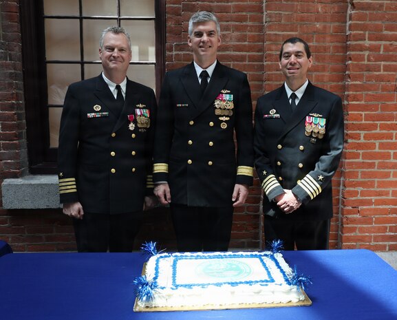 NSWCPD welcomed Capt. Ashley S Wright (right), who relieved Capt. Joseph Darcy (left) as Commanding Officer during NSWCPD’s Change of Command Ceremony in Philadelphia on May 15, 2026. Commander, Naval Surface and Undersea Warfare Centers Rear Adm. Peter Small (center) served as the ceremony’s guest speaker and presided over the change of command. (U.S. Navy photo by Phil Scaringi, CTR)
