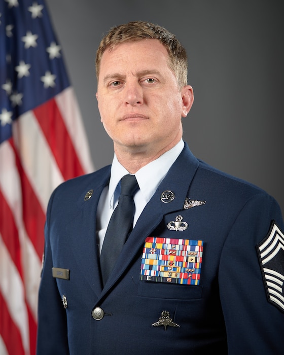 CMSgt Blair A. Baerny is the Wing Command Chief Master Sergeant for the 123rd Airlift Wing, Kentucky Air National Guard, Louisville, Ky. He provides leadership and management of resources for all enlisted personnel. The Chief also advises the Wing Commander on issues affecting the morale and well- being of personnel and their families, as well as matters relating to manpower, equipment and training during peacetime in preparation for the wing's wartime mission. He is accountable for working with a wide variety of federal and state authorities in all aspects of operations, personnel, equipment and funding matters.