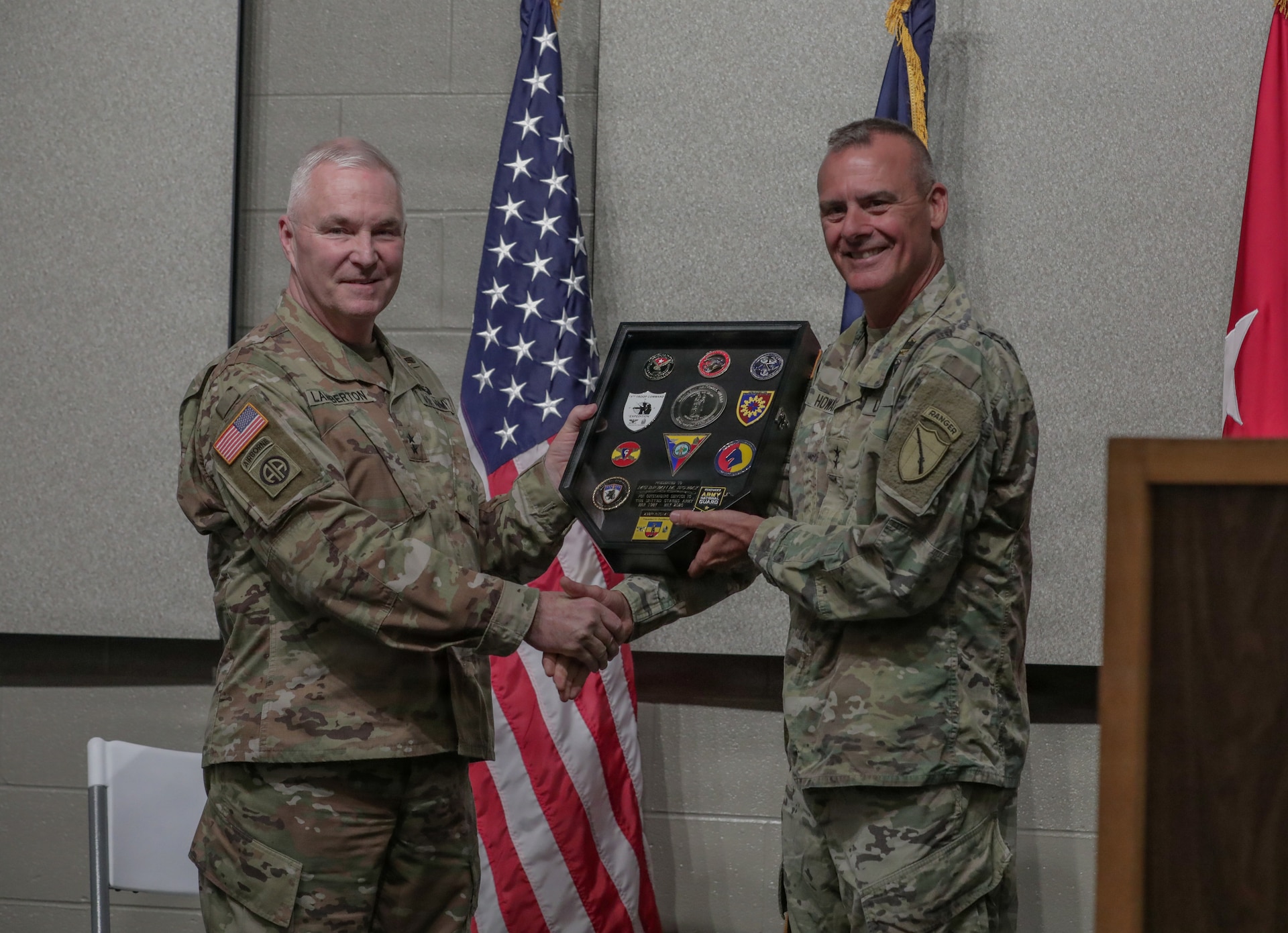U.S. Army Maj. Gen. Bryan Howay receives a shadow box from Maj. Gen. Haldane B. Lamberton, Kentucky's adjutant general, during his retirement ceremony at Boone National Guard Center in Frankfort, Kentucky, May 16, 2026.