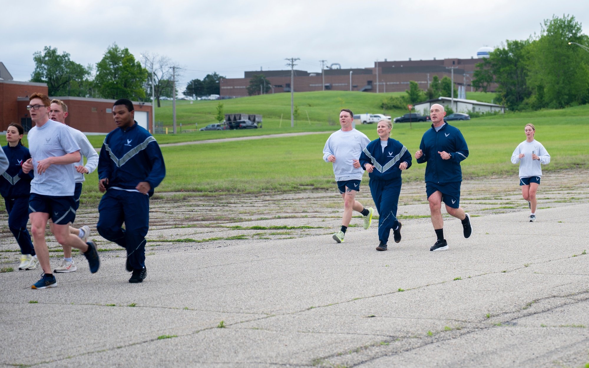 Chief Master Sgt. Stefan Blazier, Deputy Chief of Staff for Intelligence senior enlisted leader, works out with Airmen from the National Air and Space Intelligence Center during a morning physical training session at Wright-Patterson Air Force Base, Ohio, April 30, 2026.